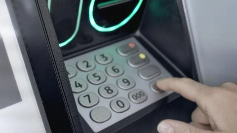 Securing Transactions: Protecting Your PIN at the ATM Stock Photos