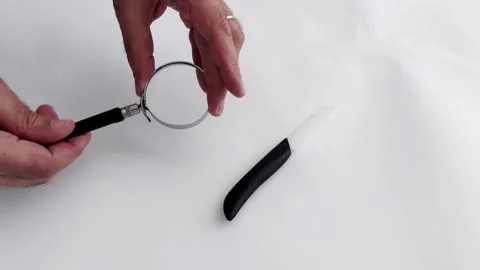 Securing the View: How to Mount a Magnifying Glass Handle Stock Footage 315637575