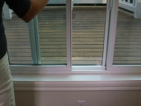 Securing Window of home Stock Footage 83367524