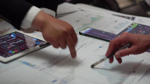 Securities traders are analyzing the K-line data of commercial and financial Stock Footage 154535198