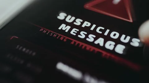 Security alert identifying a Suspicious Message as a phishing attempt Stock Footage 334932068