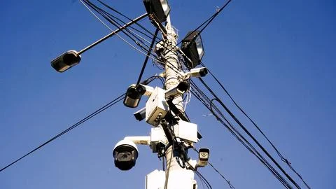 Security and alarm systems technology concept: Many CCTV cameras are hanging in Stock Photos