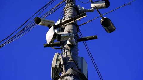 Security and alarm systems technology concept: Many CCTV cameras are hanging in Stock Photos