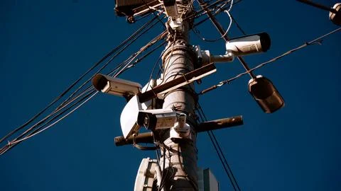 Security and alarm systems technology concept: Many CCTV cameras are hanging in Stock Photos