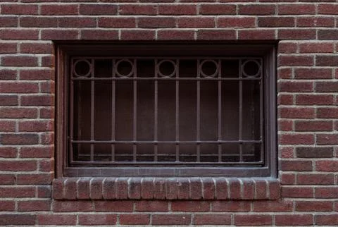 Security Bars On Old Window In Brick Wall Stock Photos