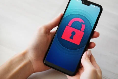 Security breach unlock padlock icon on mobile phone screen. Cyber protection Stock Photos
