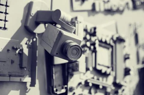 Security camera and old computer components Stock Photos