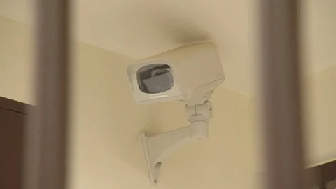 Security camera in Back of Jail Gate around prison walls Video stock 88270817