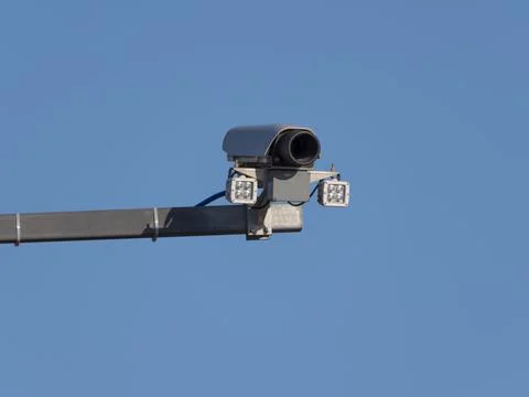 Security camera on blue sky background Stock Photos
