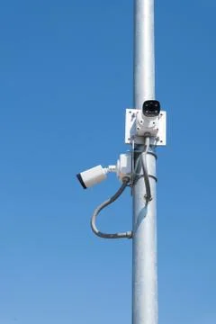 Security camera with blue sky. Stock-Fotos