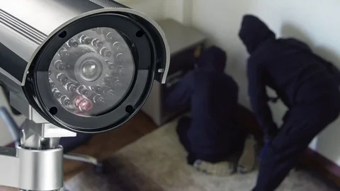 Security camera capturing two thiefs wearing balaclava inside the house Stock Footage 83635093
