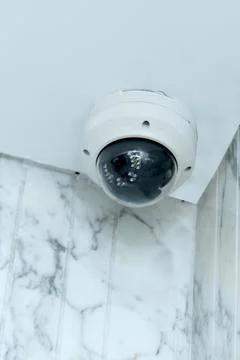 Security camera CCTV hangin in the wall Stock Photos