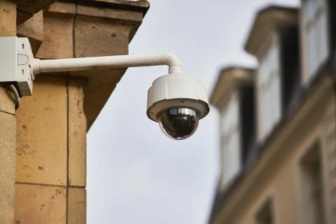 Security Camera, CCTV on location. Security camera on the wall in old city Stock Photos