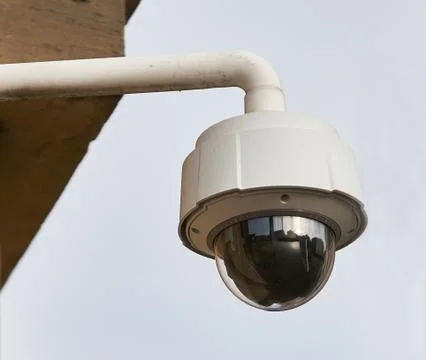 Security Camera, CCTV on location. Security camera on the wall in old city Stock Photos