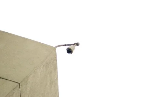 A security camera on the corner of a building Stock Photos