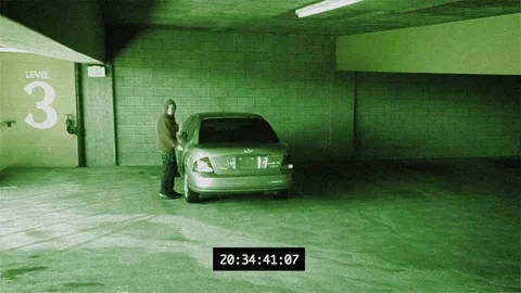 Security camera footage of a car being broken into Stock Footage 221524420