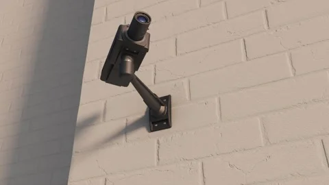 A security camera inspects the surrounding environment. Stock Footage 254543234