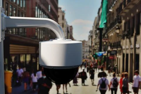 Security camera keeping an eye on citizens. 3D Render Stock Photos