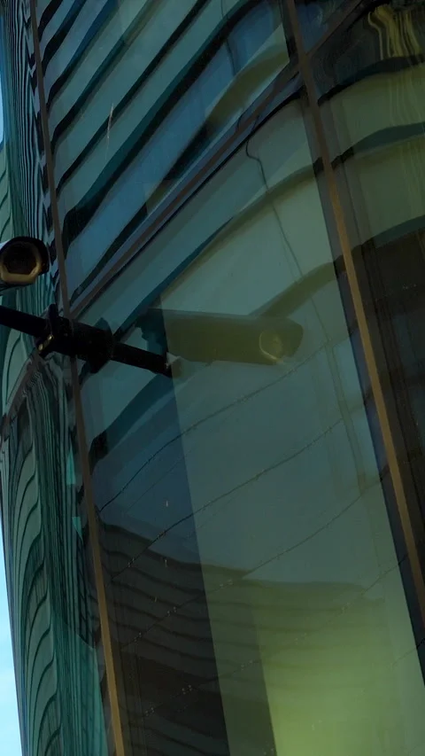 Security Camera On Modern Glass Building Architecture Vertical Shot Stock Footage 331353041