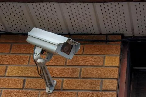 Security Camera Mounted on Brick Wall Stock Photos