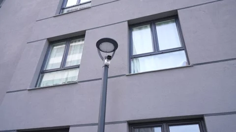 Security Camera Mounted on Urban Light Pole Stock Footage 311433696