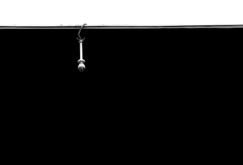 Security camera mounted on a wall Stock Photos