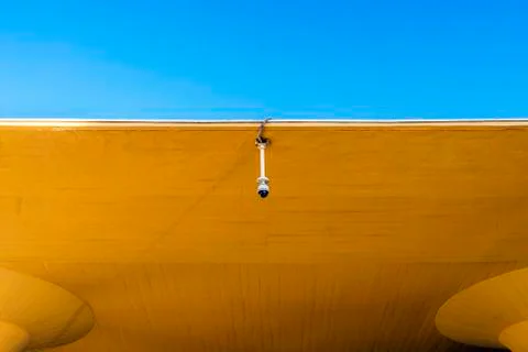Security camera mounted on a wall Stock Photos