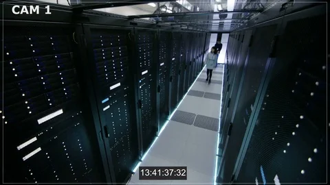 Security Camera N1 Footage of Asian Female IT Specialist and Caucasian Male  Stock Footage 73877776