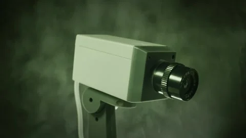 Security camera observing in smoky green environment Stock Footage 314012145