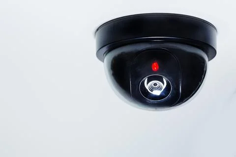 A security camera or cctv camera on ceiling . Stock Photos