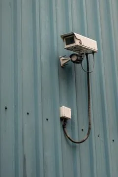 Security camera on the side of a commercial unit Stock Photos