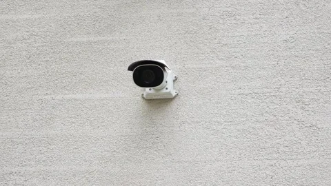 Security Camera Successfully Mounted on the Wall for Stock Footage 296428258