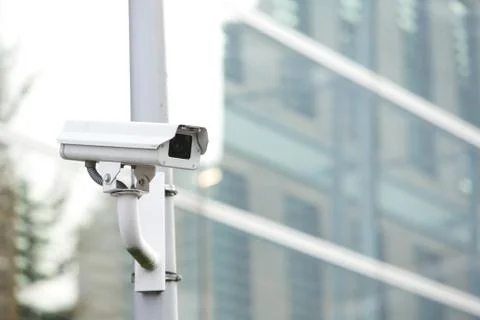 Security camera system guarding business building Stock Photos