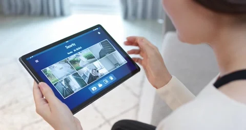 Security camera system on tablet Stock Footage 140950473