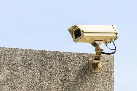 Security Camera on the Top of Brown Building, CCTV Camera Stock Photos