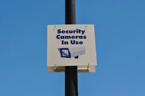 Security camera in use sign Foto stock
