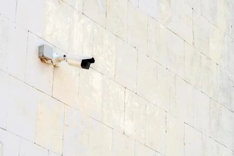 Security camera on wall modern building Foto stock