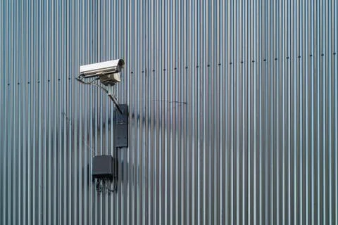 Security camera on a wall Stock Photos