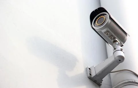 Security camera on the wall Foto stock