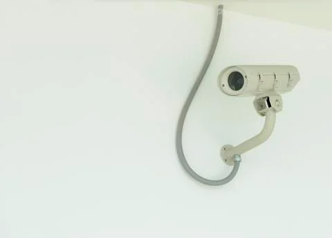 Security camera on the wall Stock Photos