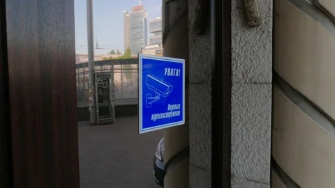A Security Camera Warning Near restaurant in kiev Stock Footage 89411509
