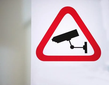 Security Camera Warning Sign With Red Triangle Symbol Foto stock