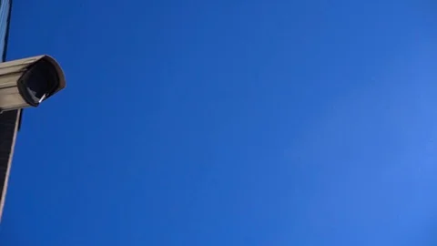 Security camera on white wall Stock Footage 91987177