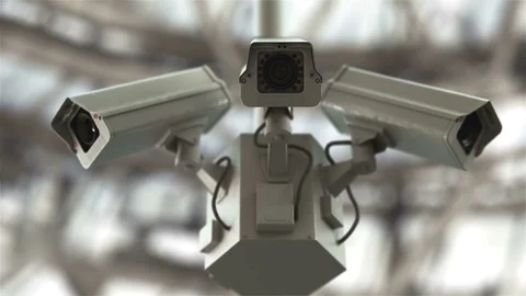 Security cameras against blue sky in 4K Stock Footage 77154521