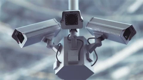 Security cameras against blue sky in 4K Stock Footage 77154655