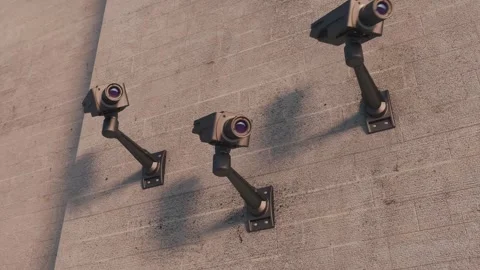 Security cameras look around and study the viewer, focusing on him. 3d rendering Stock Footage 250315983