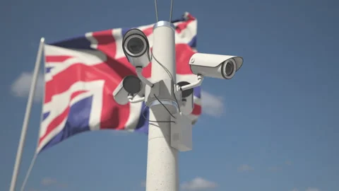 Security cameras on the pole near flag of the UK, looping 3d animation Stock Footage 150830003