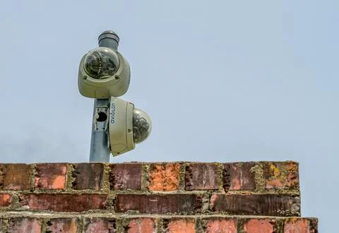 Security Cameras on a Wall Foto stock