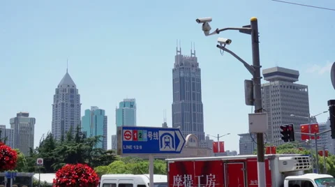Security cameras watch over an intersection in China. Stock Footage 47297440
