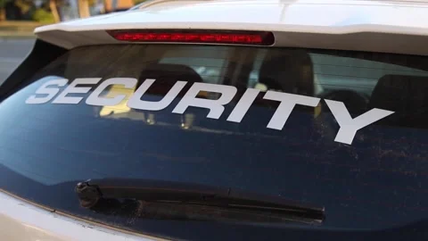 Security car patrolling streets before sunset Stock Footage 201251946